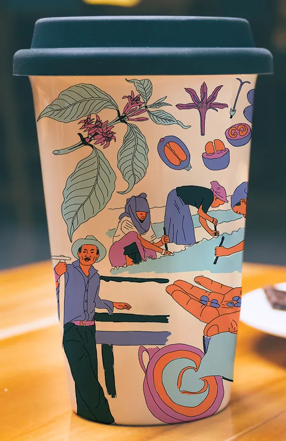 Reusable travel cup wrapped in the Pact Coffee farming illustration, dark lid on top